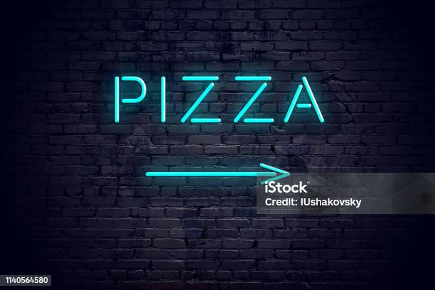 Brick Wall With Neon Arrow And Sign Pizza Stock Photo - Download Image Now - Brick, Pizza, Arrow Symbol