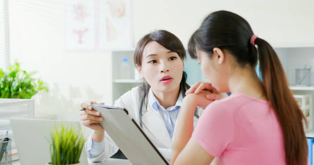 istock asian doctor diagnoses patient 1140565757
