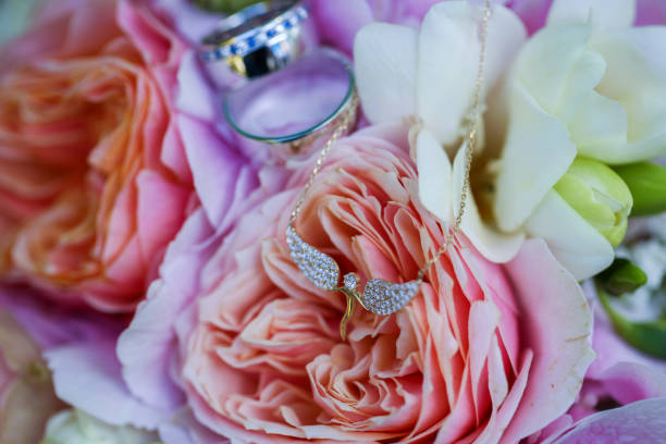 istock Close up with rings and flowers 1140569048