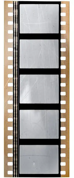 Photo of real 35mm movie film strip with sound waves on white background