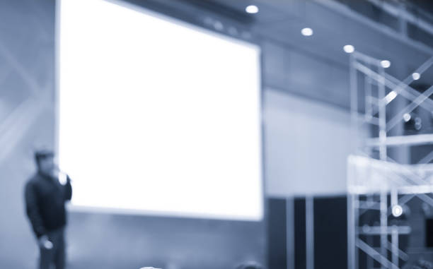 istock Presenter Presenting. Business Presentation. Business Speaker Seminar Photo. Tech Conference Discussion. Manager Meeting Successful Team. Group of Technology People. Business Start Up Entrepreneurs. 1140569428