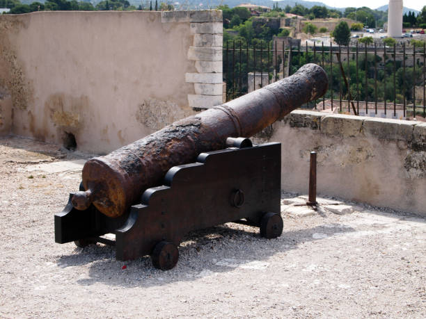 istock Old cast iron gun on a wooden carriage. 1140570661