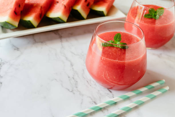 istock Watermelon drink in glasses with mint. Summer drink concept. 1140571155