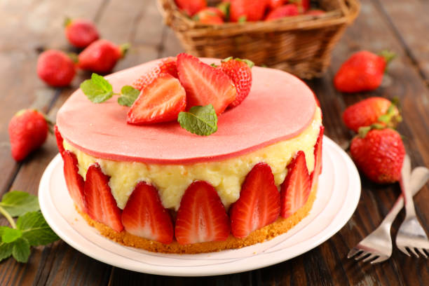 istock delicious strawberry cake on wood background 1140572573