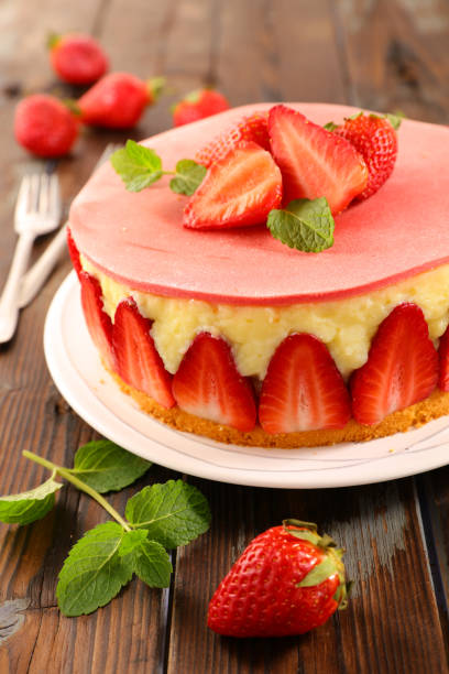 istock delicious strawberry cake on wood background 1140572574
