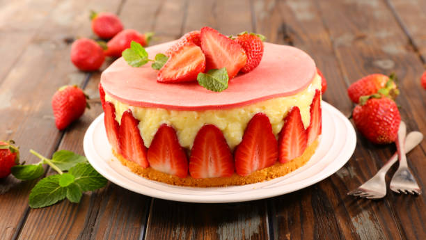 istock delicious strawberry cake on wood background 1140572575