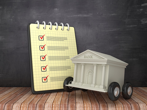 Check List Note Pad with Bank Building on Wheels on Chalkboard Background  - 3D Rendering