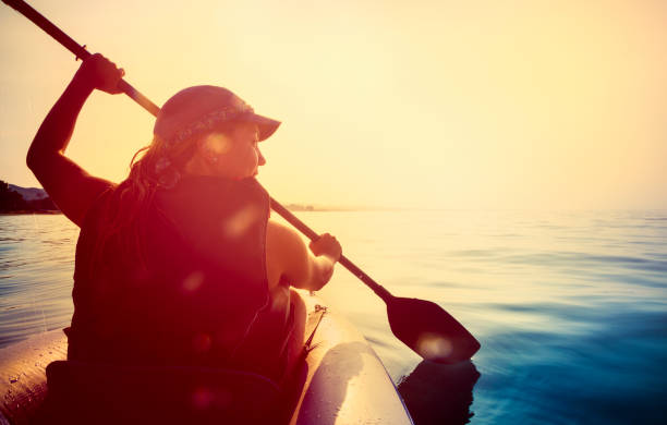 istock Kayaking on the sea at sunset 1140573607
