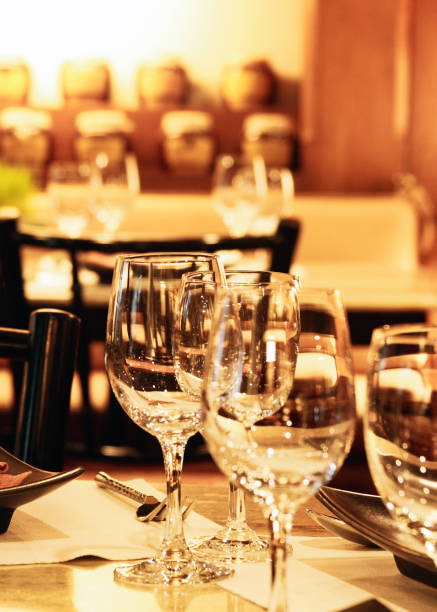 istock Glasses for wine and champagne at a buffet table, Group of empty wine glasses, Elegant table set 1140573820