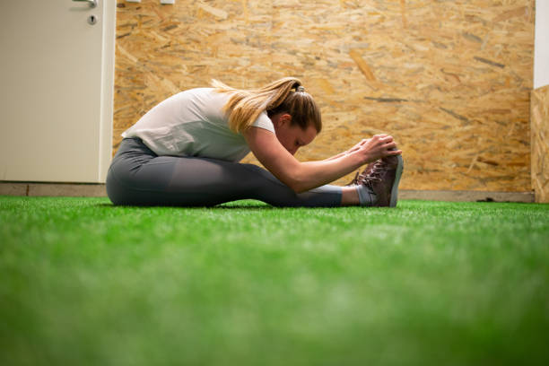 istock Young woman stretching up 1140574213