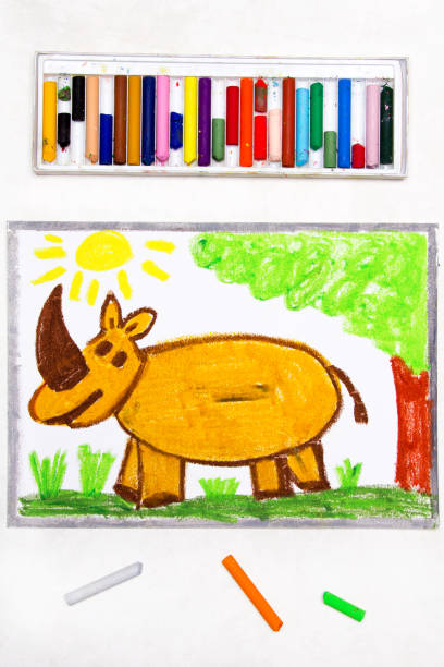 istock Colorful drawing: cute smiling rhinoceros in forest 1140575119