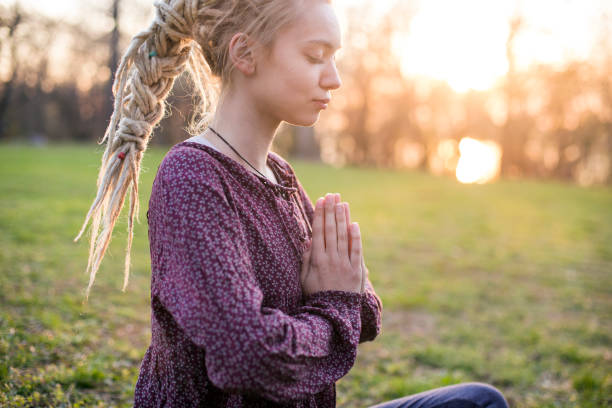 istock Young woman doing yoga 1140575169
