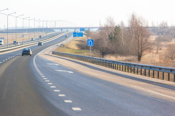 istock car highway leaving into the distance 1140575470