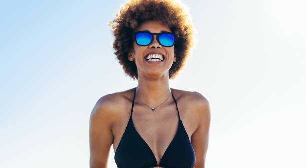 istock Woman having fun at the beach 1140576651