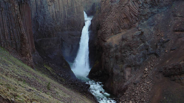 istock Majestic waterfall. Cold day in mountains 1140578404