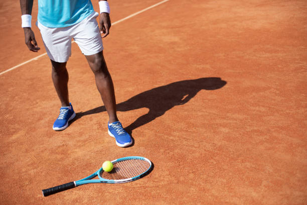 istock Man is resting after tennis game outdoor 1140580676