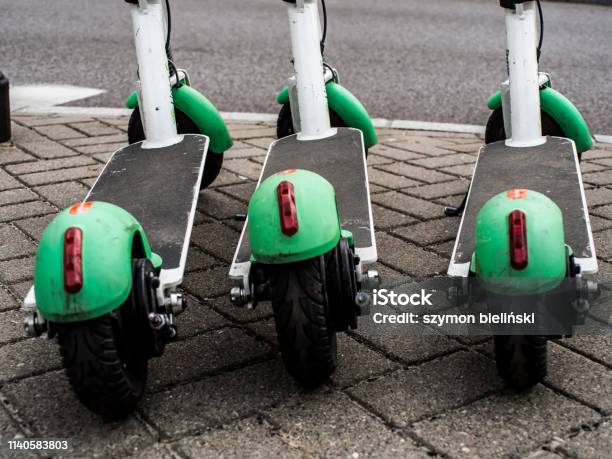 Electric Urban Scooters Stock Photo - Download Image Now - Lime, Electricity, Speed