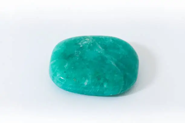 Amazonite, close-up of a precious stone with white background, collectibles