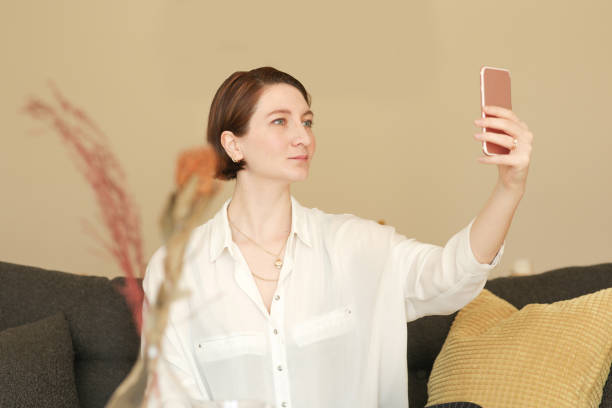 istock young woman taking a selfie 1140585267