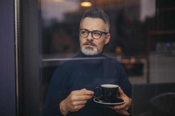 istock Mature man in the coffee shop 1140589518