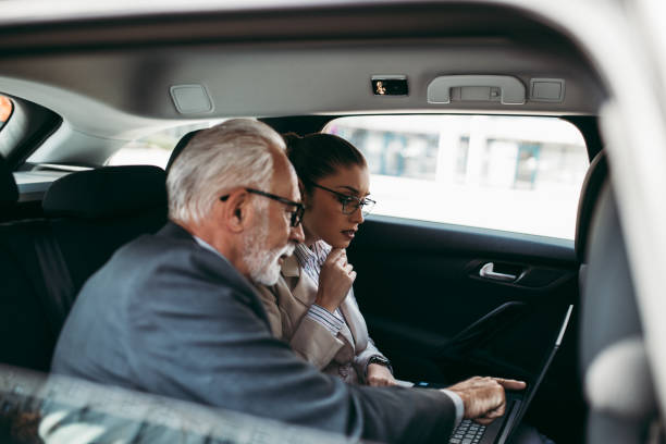 istock Business people in car 1140591795