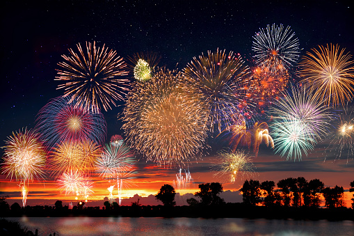 Fireworks at the lake during party event or wedding reception