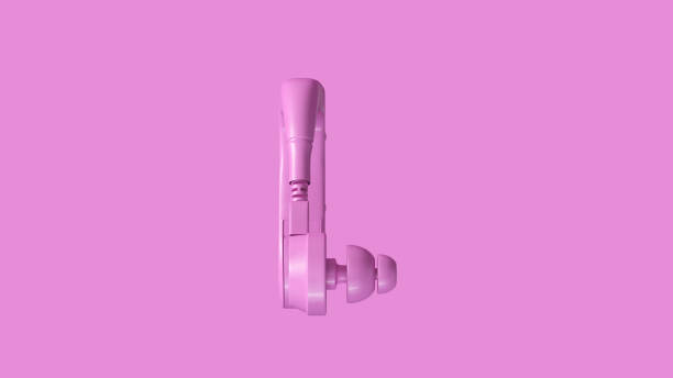 istock Pink Behind the Ear Hearing Aid 1140593329