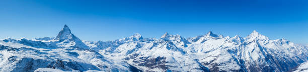 Swiss Mountains Panorama High Resolution Panorama shot of the Swiss alps, including the famous Matterhorn swiss alps photos stock pictures, royalty-free photos & images