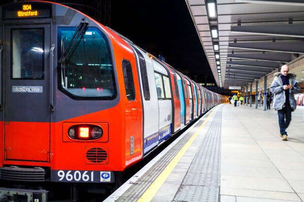 Underground train at station London, UK - Circa 2015 : A London Underground Jubilee Line train at Stratford station london england rush hour underground train stock pictures, royalty-free photos & images