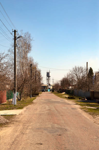 istock Water tower with mobile communication transmitters against the blue sky 1140606262