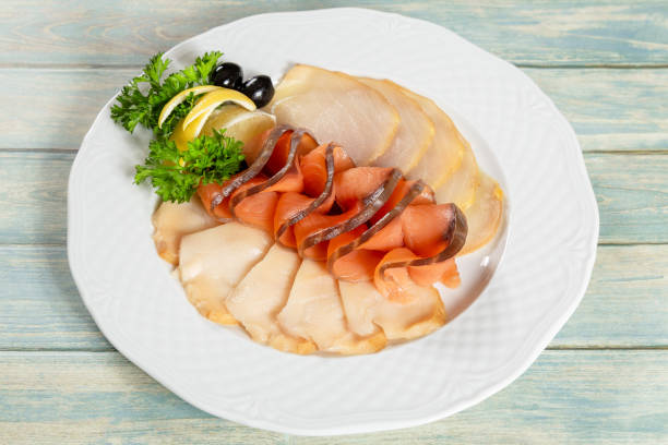 Cold fish plate. Set of appetizers on wooden table stock photo