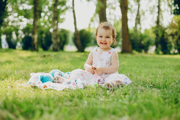 Little girl is resting in the park stock photo