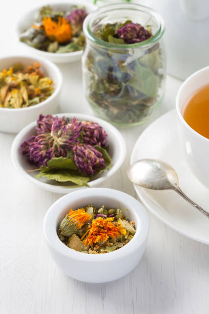 istock Cup of herbal tea, white background 1140609842