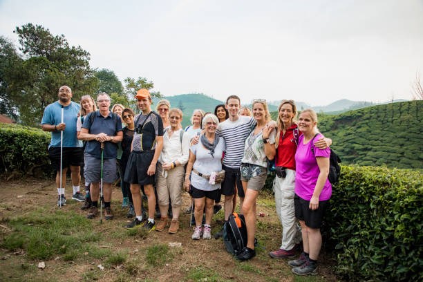 Hikers Group Photo Group photo of hikers embarking on a trip towards the Letchi Hills in Munnar, India. Some members of the group are visually impaired. disabled person hiking outdoors stock pictures, royalty-free photos & images