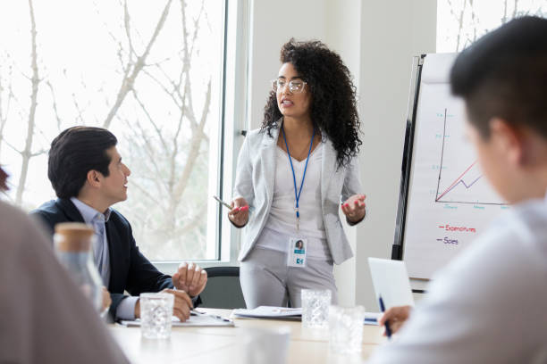 istock Focused businesswoman gives presentation 1140610929