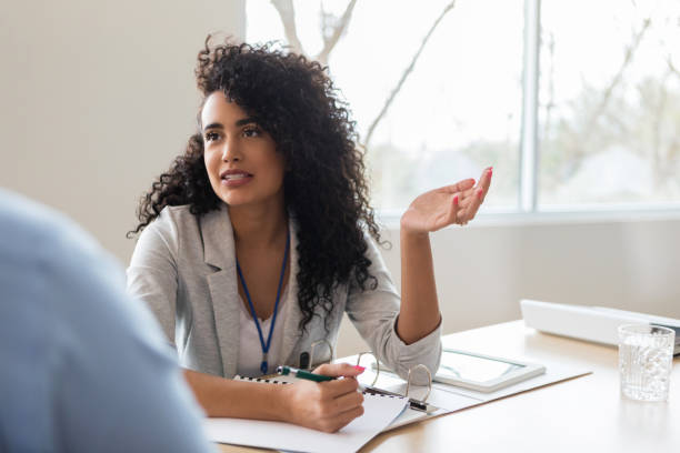 istock Confident young female executive meets with colleague 1140610939