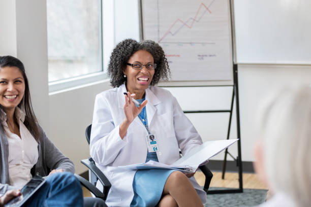 istock Confident doctor participates in staff meeting 1140610944