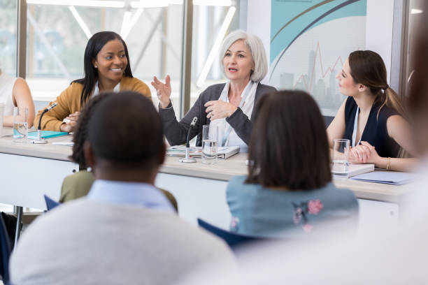 istock A mature woman explains the focus of the panel 1140611131