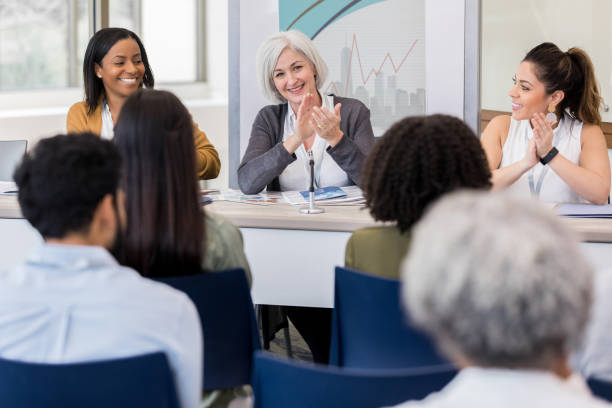 istock A women's health panel applauds speaker 1140611139