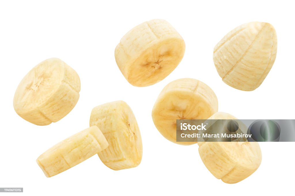 Bananas on white Flying banana slices, isolated on white background Banana Stock Photo