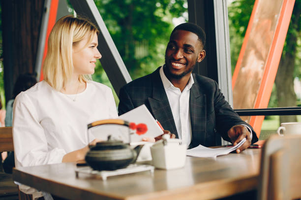 istock Business partners sitting in a cafe 1140611643