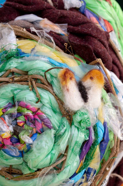 istock Recycled plastic waste woven sculpture. Felted butterfly. Environment concept. 1140614767