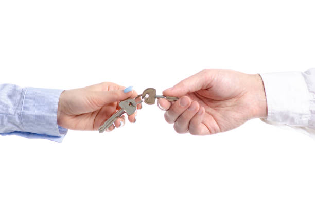 istock Hand give key to hand 1140615312