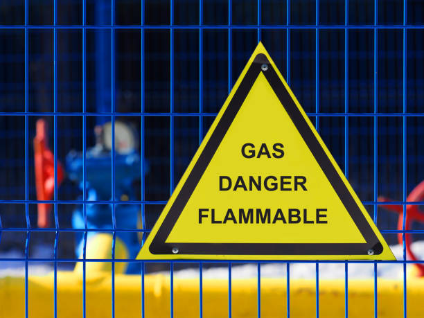 Warning sign dangerous flammable gas, gas equipment, storage area of industry Warning sign dangerous flammable gas, gas equipment, storage area of industry flammable photos stock pictures, royalty-free photos & images