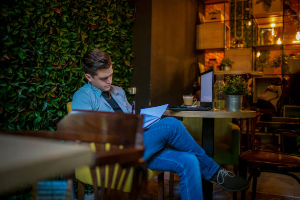 istock caucasian man at the caffee 1140618531
