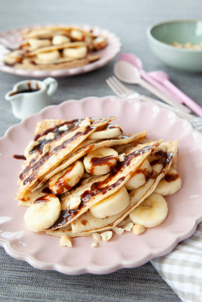istock Delicious pancakes with fresh banana 1140619401