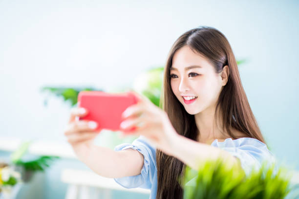 istock woman selfie happy 1140619471