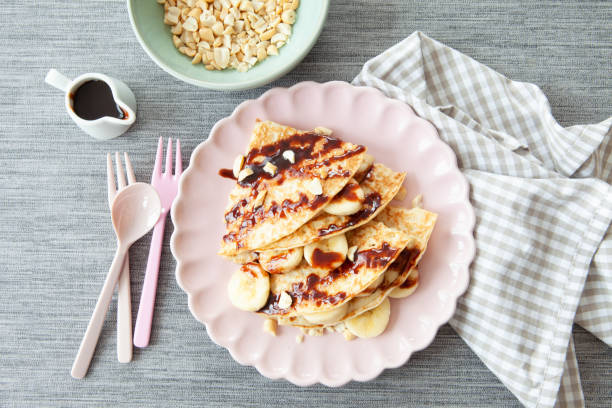 istock Delicious pancakes with fresh banana 1140619586