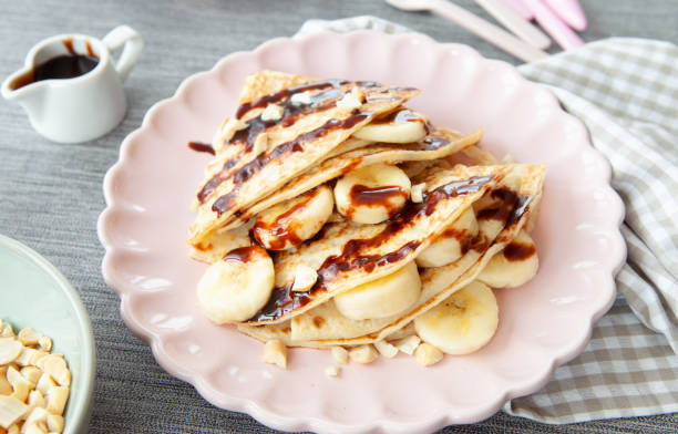 istock Delicious pancakes with fresh banana 1140619663