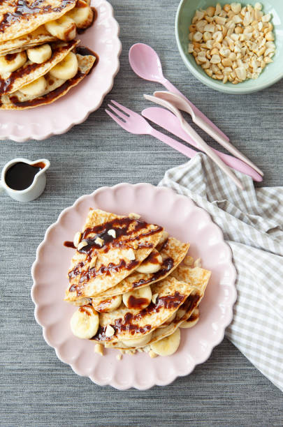 istock Delicious pancakes with fresh banana 1140619738